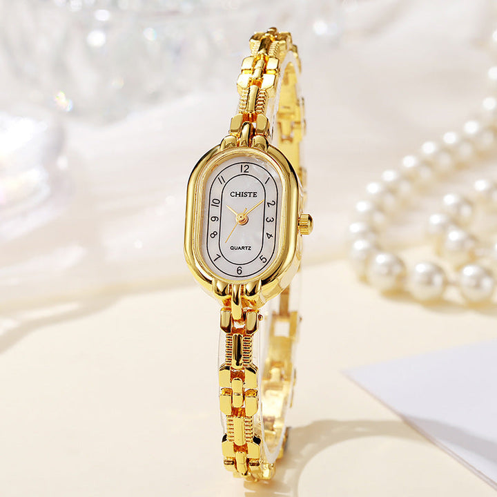 Alira™ | 18K Gold Moment Watch