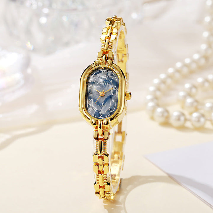 Alira™ | 18K Gold Moment Watch
